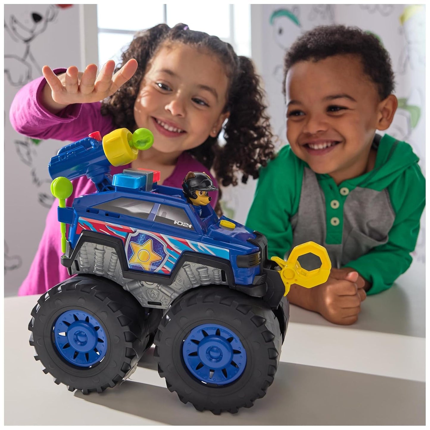 PAW Patrol Rescue Wheels Chases Deluxe Monster Truck with Bullet Drop, Motorised Winch, Lights & Sounds, Toy for Children from 3 Years