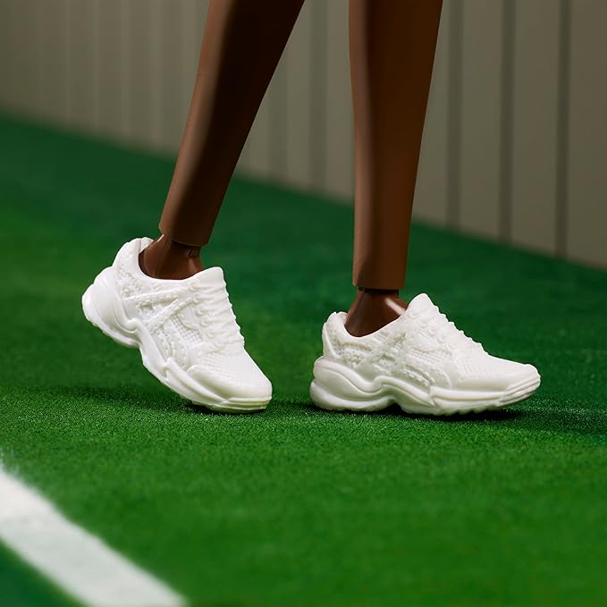 Barbie Inspiring Women Series, Venus Williams Fashion Doll with Signature Tennis Uniform and Racket, Includes Displayable Packaging