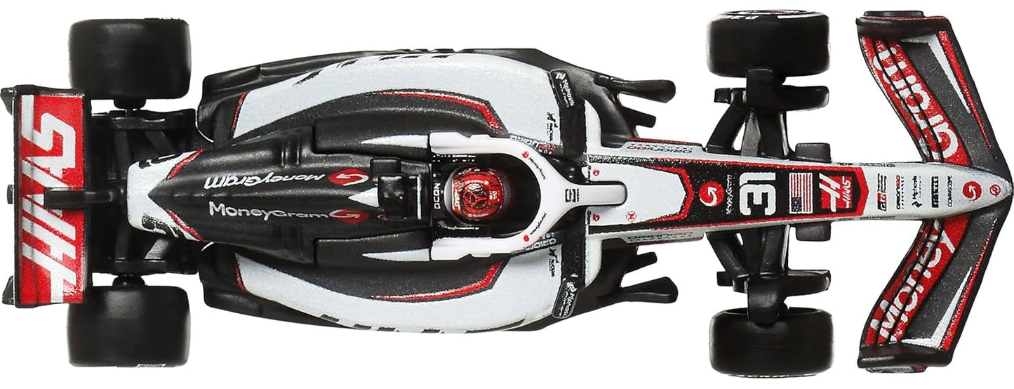 Hot Wheels 1:64 Scale Premium Race Team HAAS - Driver 1 Die-Cast Formula 1® Collectible Toy Race Car with Real Riders Tires & Metal/Metal Body & Chassis