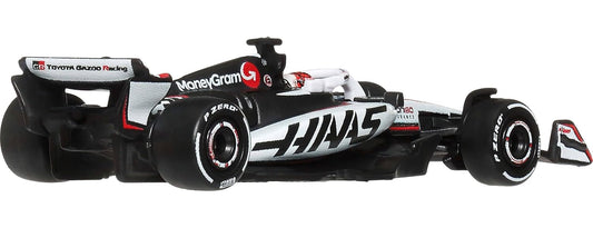 Hot Wheels 1:64 Scale Premium Race Team HAAS - Driver 1 Die-Cast Formula 1® Collectible Toy Race Car with Real Riders Tires & Metal/Metal Body & Chassis